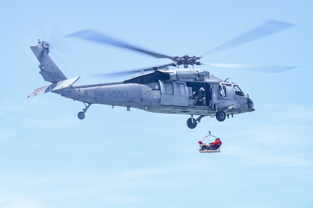 Tech. Sgt. Solomon Walker, a flight engineer assigned to the 757th Airlift Squadron, is lifted out of the water during a mass casualty rescue exercise on April 19, 2023, at Naval Air Station Key West, Florida.