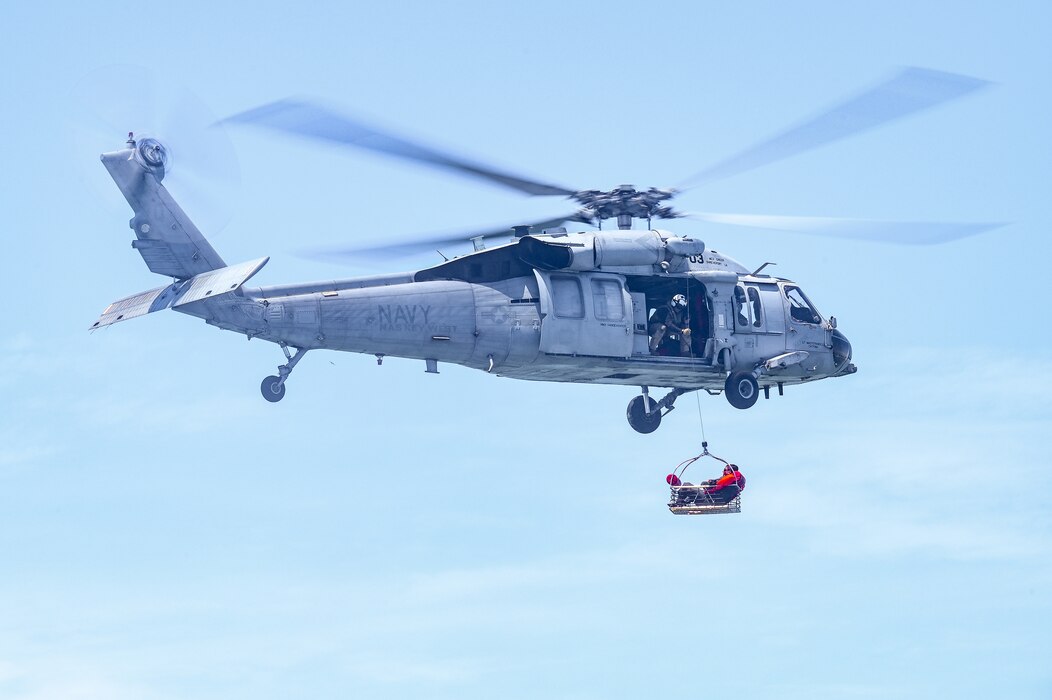 Tech. Sgt. Solomon Walker, a flight engineer assigned to the 757th Airlift Squadron, is lifted out of the water during a mass casualty rescue exercise on April 19, 2023, at Naval Air Station Key West, Florida.