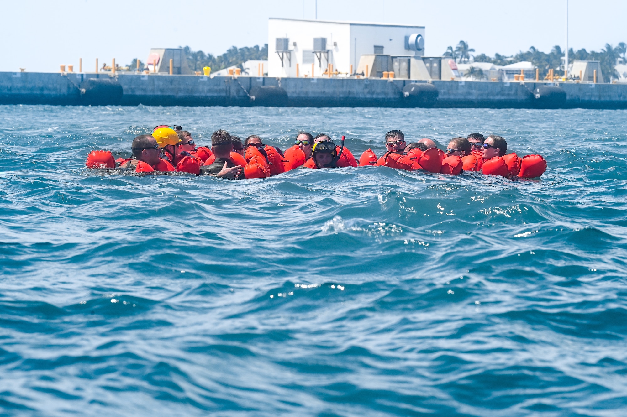 Reserve Citizen Airmen assigned to the 910th Operations Group tread water during a mass casualty rescue exercise on April 19, 2023, at Naval Air Station Key West, Florida.