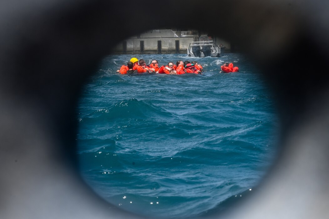 Reserve Citizen Airmen assigned to the 910th Operations Group tread water during a mass casualty rescue exercise on April 19, 2023, at Naval Air Station Key West, Florida.