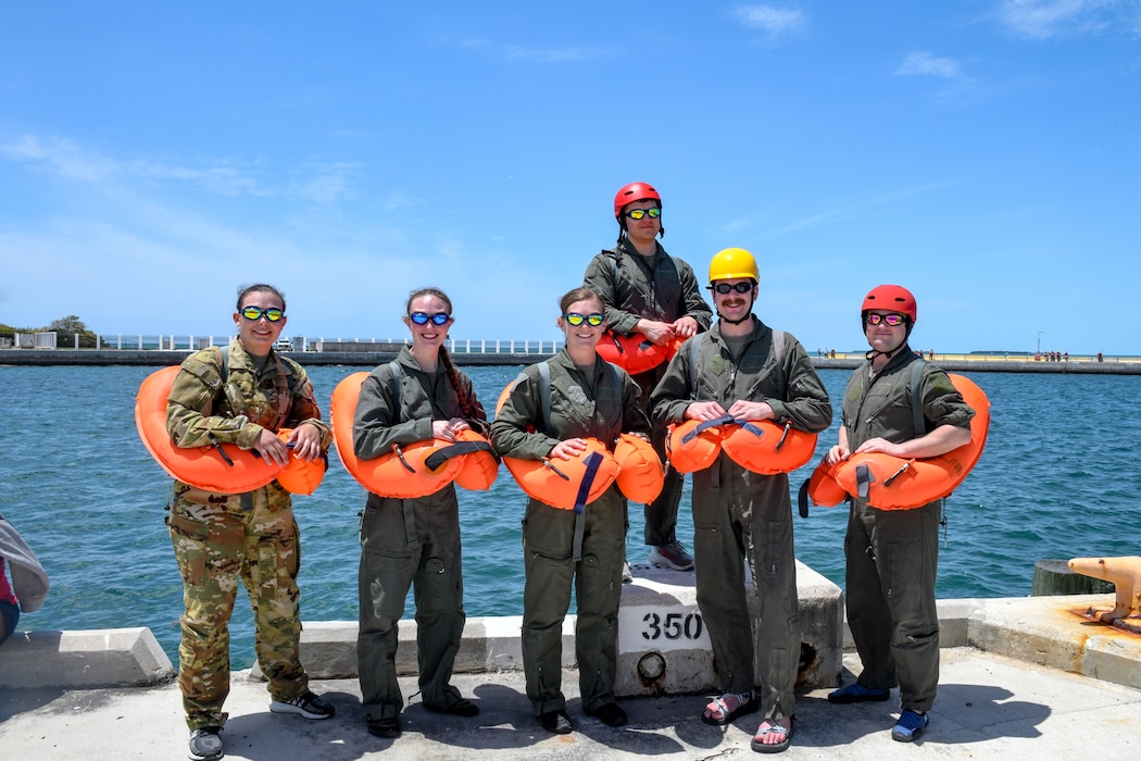 Reserve Citizen Airmen assigned to the 910th Operations Group pose for a photo during a mass casualty rescue exercise on April 19, 2023, at Naval Air Station Key West, Florida.