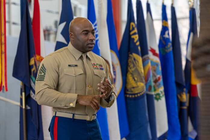 U.S. Marine Corps Sgt. Maj. Marquis L. Young, former sergeant major of 9th Marine Corps District Headquarters, speaks to the guests during a relief and appointment ceremony at Naval Station Great Lakes, Great Lakes, Illinois, Dec. 22, 2022. Young will proceed to MCAS Miramar, where he will assume the duties as the MCAS Miramar Base Sergeant Major. (U.S. Marine Corps photo by Sgt. Reagan Anderson)