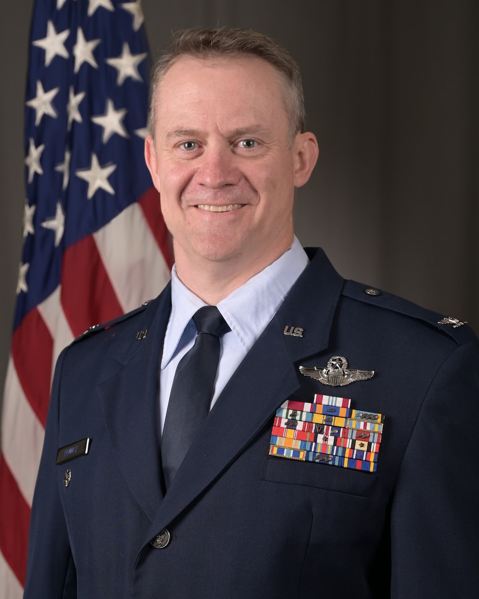 Air Force officer poses for photo in service uniform