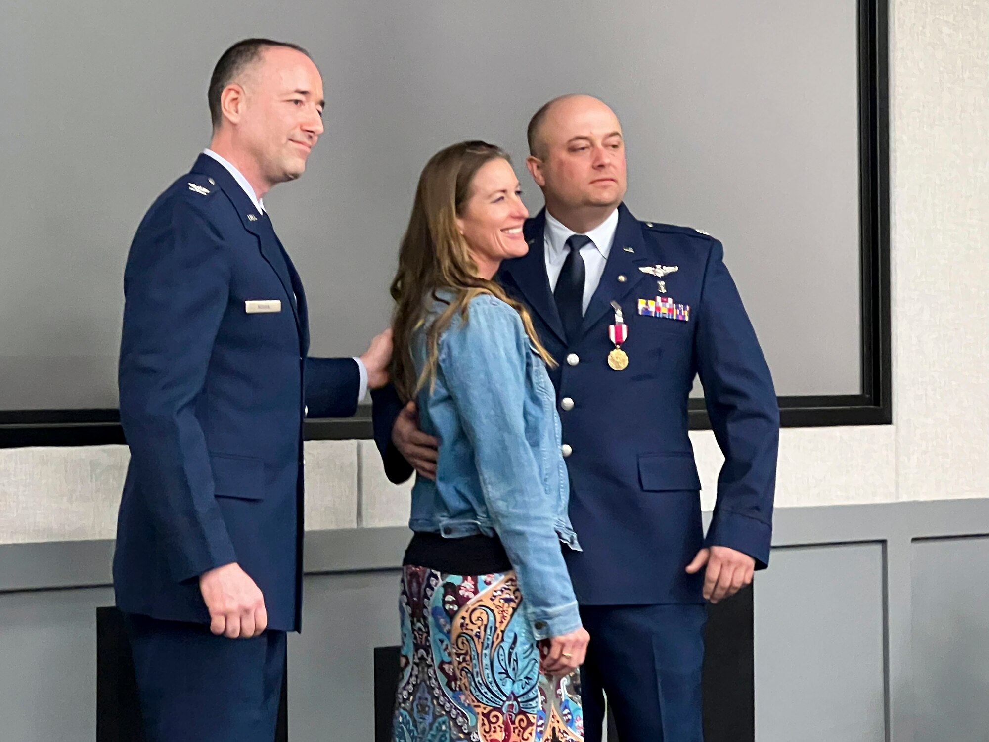 Lt. Col. Matthew Taranto, Chief Aerospace Physiologist, U.S. Air Force Test Pilot School takes a picture with his wife after conducting his "fini-flight" before retirement March 31st. (Photo courtesy of Staff Sgt. Elizabeth Taranto)