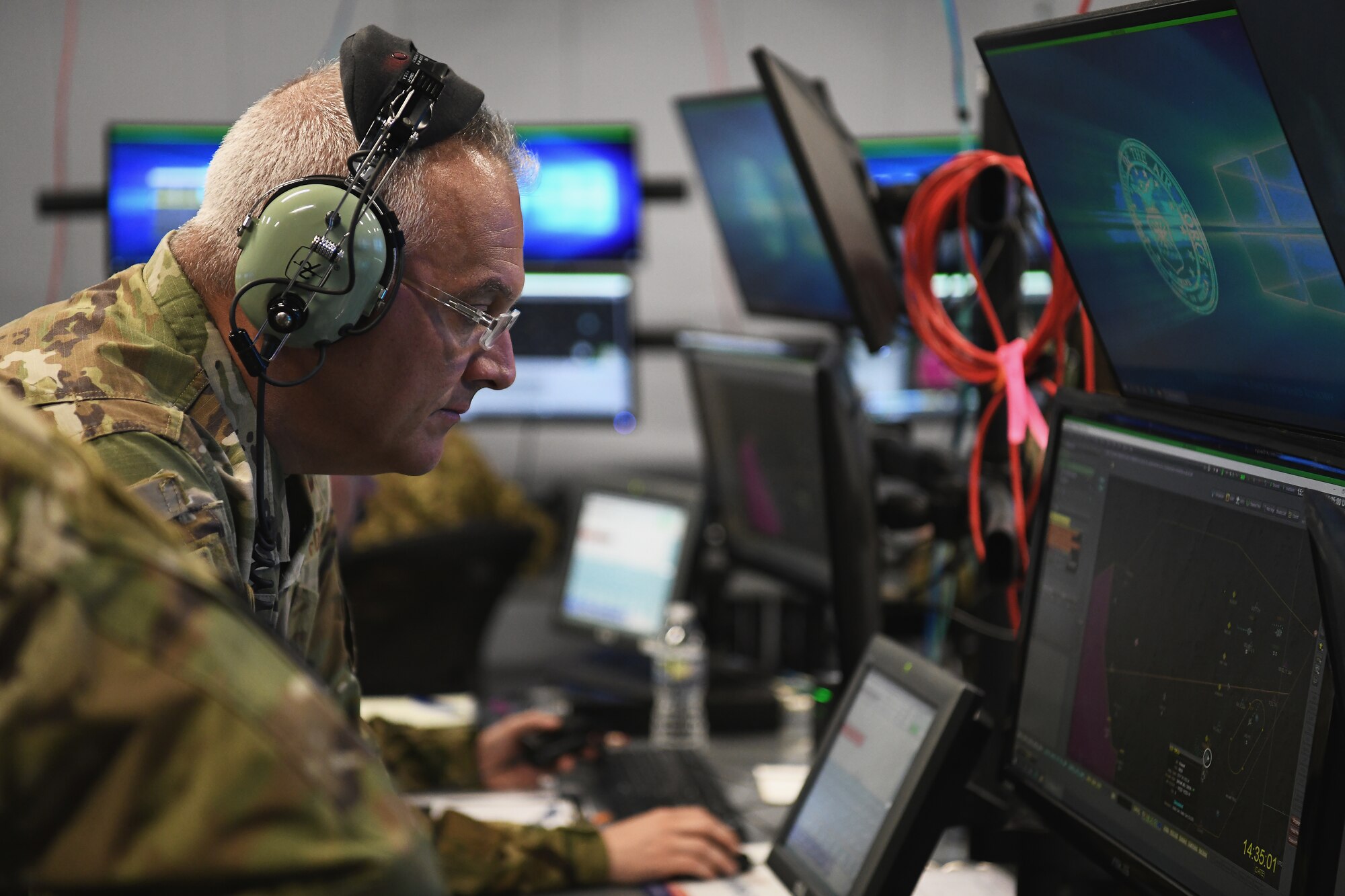 U.S Air Force Brig. Gen. David B. Johnson, assistant adjutant general for the Ohio Air National Guard observes a joint training exercise with service members from Lithuania, Latvia and Hungary on April 24, 2023 in Blue Ash, Ohio. Ready, empowered Airmen are the foundation of our success, and we owe them the capabilities and concepts needed to deter tomorrow’s conflicts or prevail if deterrence fails. (U.S. Air National Guard photo by Shane Hughes)