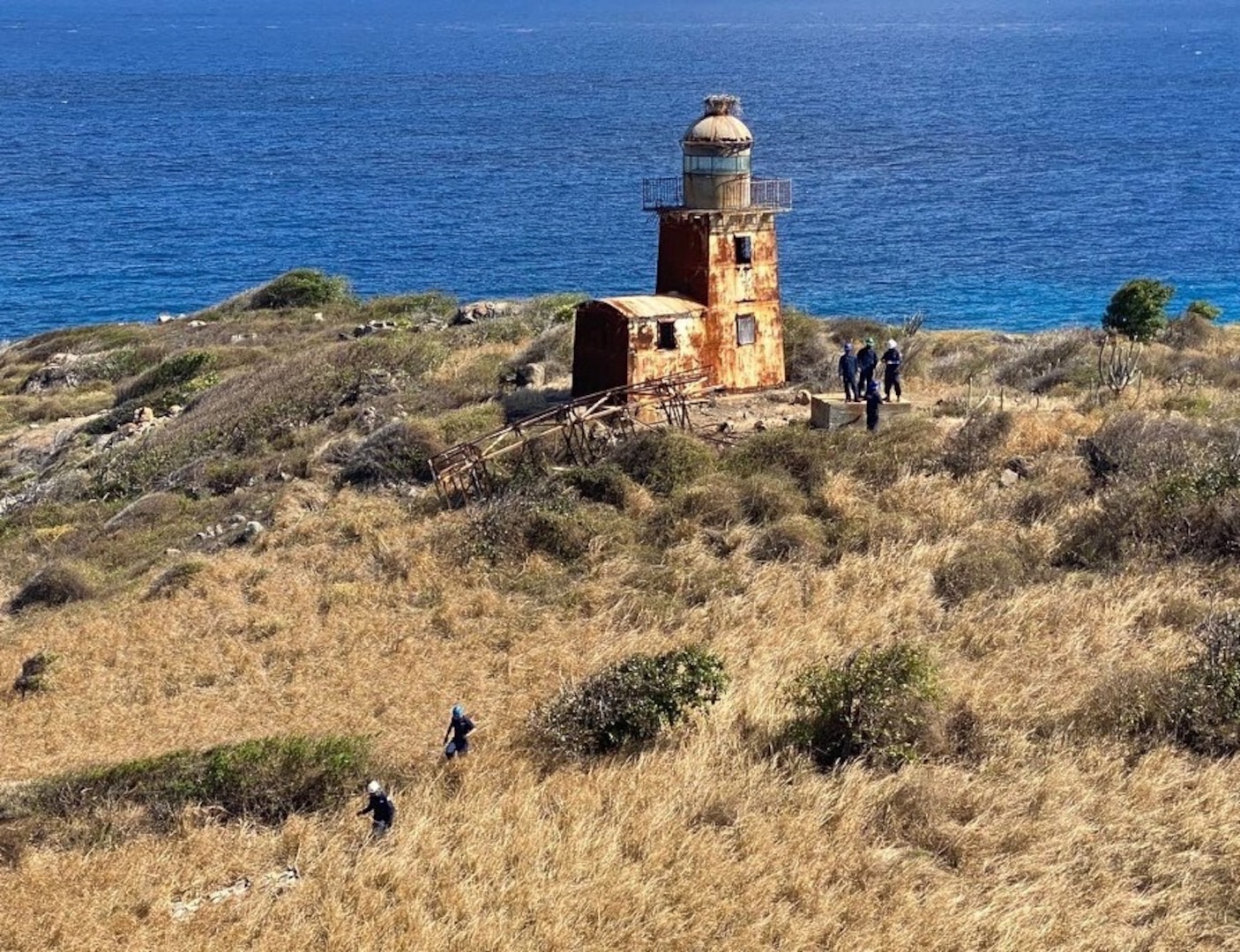 Coast Guard Aids to Navigation Team Puerto Rico working to rebuild an aids to navigation tower light on Buck Island April 21, 2023. The rebuilt tower became operational April 23, 2023, to assist maritime traffic seeking to enter Charlotte Amalie or West Gregory Channel in St. Thomas, U.S. Virgin Islands.(U.S. Coast Guard photos by Chief Petty Officer Robert Quinn)