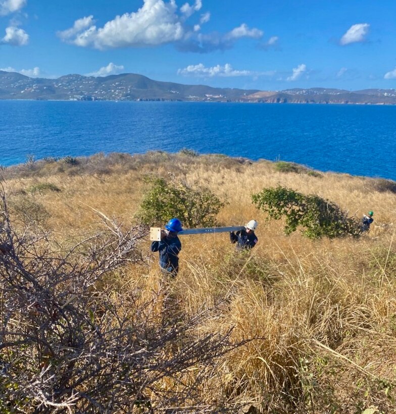 Coast Guard Aids to Navigation Team Puerto Rico crew members work to rebuild an aids to navigation tower light on Buck Island April 21, 2023. The rebuilt tower became operational April 23, 2023, and is assisting maritime traffic seeking to enter Charlotte Amalie or West Gregory Channel in St. Thomas, U.S. Virgin Islands.(U.S. Coast Guard photos by Chief Petty Officer Robert Quinn)