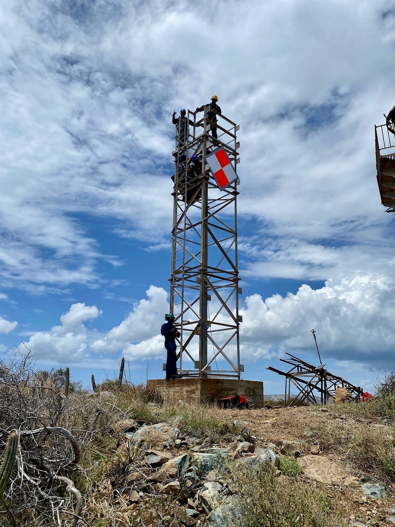 In picture are Aids to Navigation Team Puerto Rico crewmembers Seaman Joaquin Roland, Petty Officer 2nd Class Luis Santiago-Reyes, Petty Officer 1st Class Luisney Rodriguez, Petty Officer 2nd Class Shane Caraway and Petty Officer 2nd Class Dai’Shaun Wright. The ANT PR crew executed an eight-day project to rebuild the tower light on Buck Island that became operational April 23, 2023, to assist maritime traffic seeking to enter Charlotte Amalie or West Gregory Channel in St. Thomas, U.S. Virgin Islands.