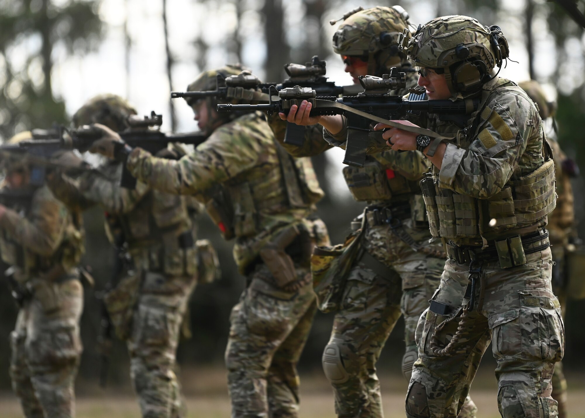 U.S. Air Force tactical air control party Airmen with the 5th Air Support Operations Squadron fire M4 weapon systems at Joint Base Lewis-McChord, Washington, April 19, 2023. Multiple times a year, the 5th ASOS holds a basic proficiency training in small arms tactics focused on safely maneuvering with the M4 and M18 weapons. (U.S. Air Force photo by Senior Airman Callie Norton)