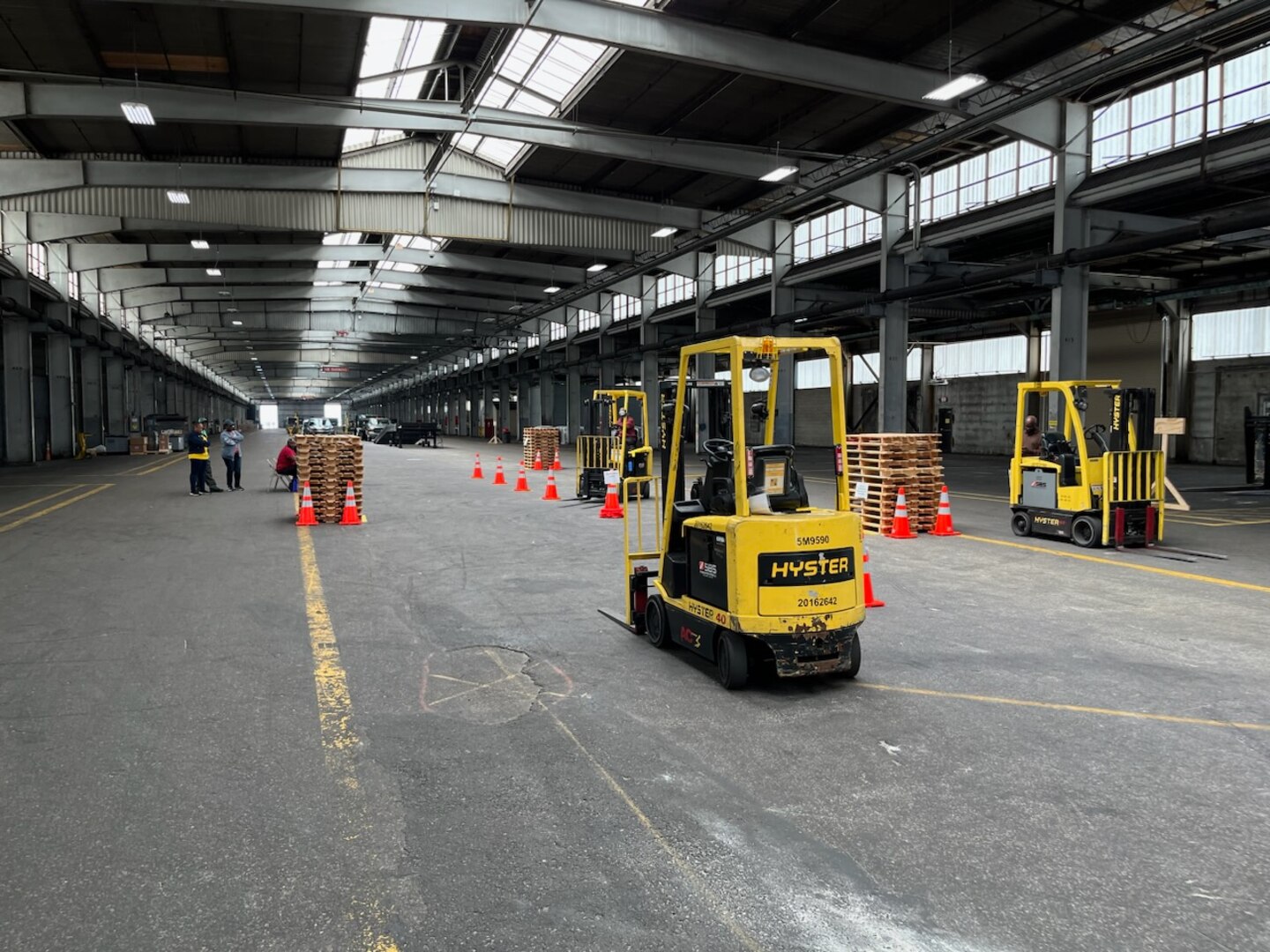 photo of forklifts in a warehouse