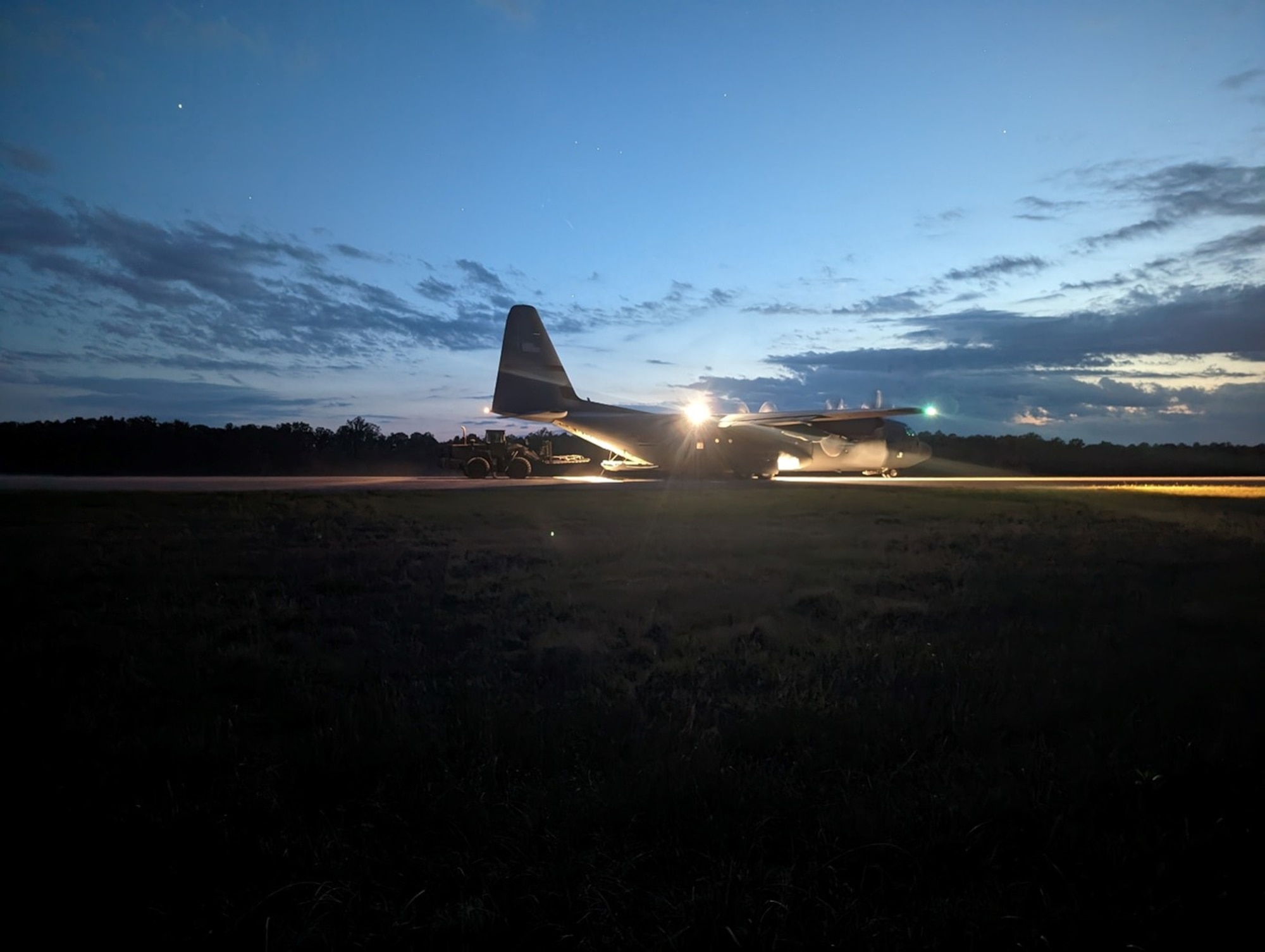 A 621st Contingency Response Group aerial porter performs engine running on/offload at Fort A.P. Hill in Bowling Green, Virginia, April 25, 2023. (U.S. Air Force photo by Capt. Glenn Grecia)