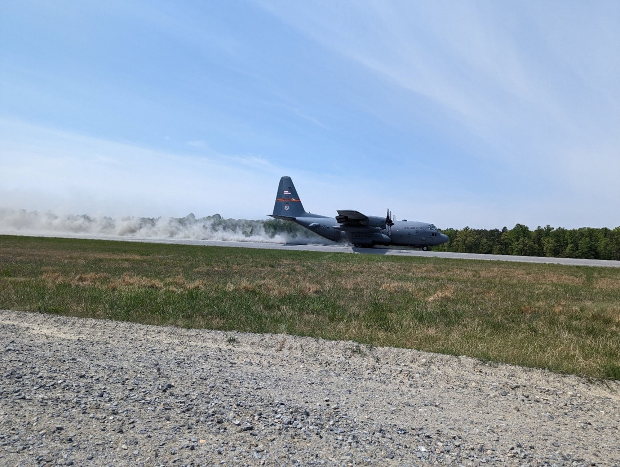 An Illinois Air National Guard C-130 Hercules aircraft performs an assault landing at Fort A.P. Hill in Bowling Green, Virginia, April 25, 2023. (U.S. Air Force photo by Capt. Glenn Grecia)