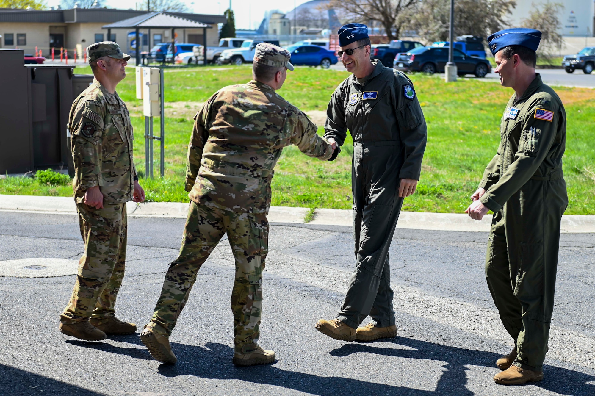 U.S. Air Force Maj. Gen. Corey Martin, 18th Air Force commander, is greeted by members from the 36th Rescue Squadron during a base tour at Fairchild Air Force Base, Washington, May 2, 2023. The goal of Martin’s visit was to learn more about Fairchild’s accomplishments and highlight 18th AF priorities.  (U.S. Air Force photo by Airman 1st Class Haiden Morris)