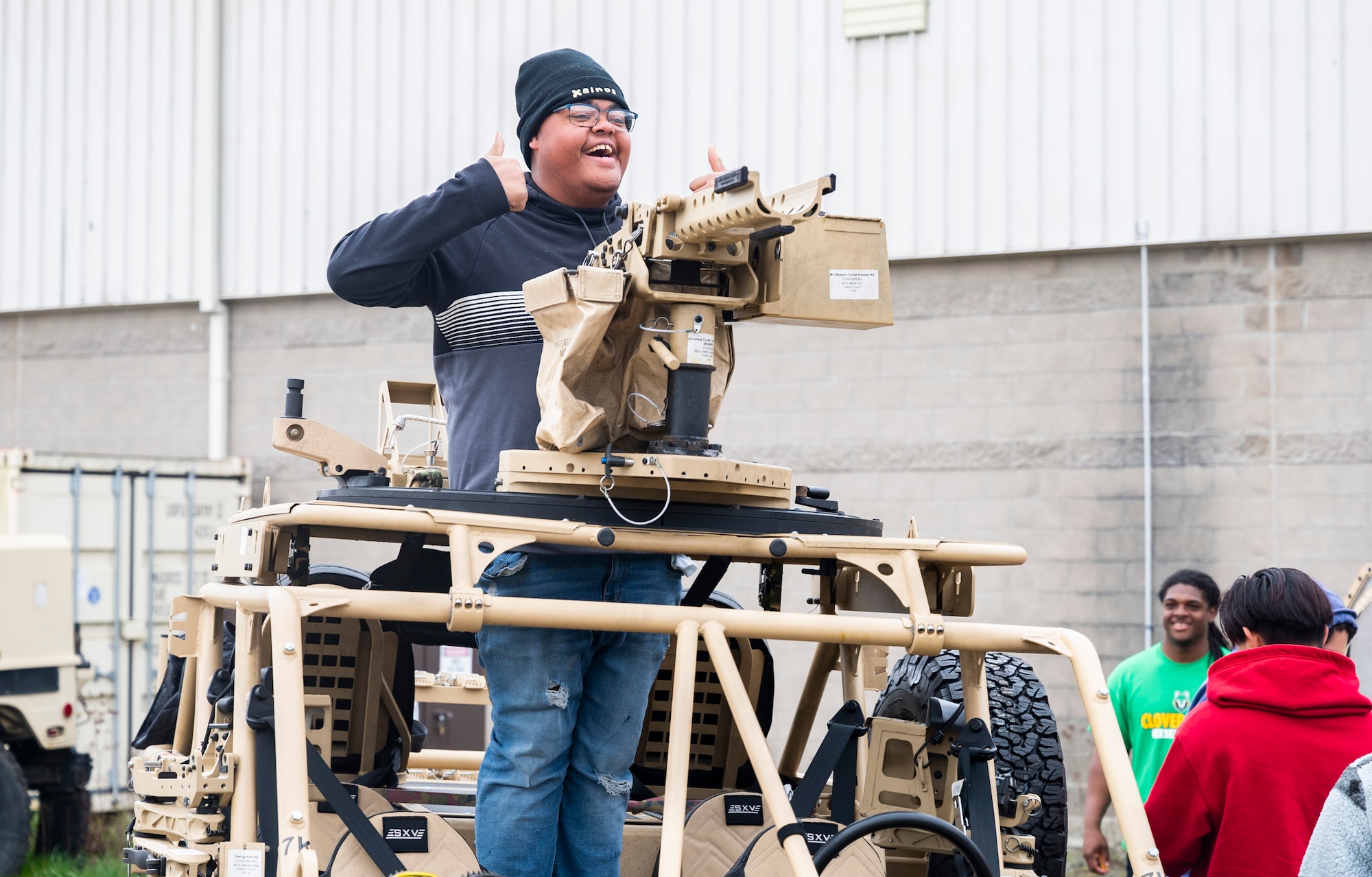 A student from Clover Park High School poses for a photo while touring the 22nd Special Tactics Squadron at Joint Base Lewis-McChord, Washington, May 4, 2023. In addition to touring the 22 STS, students toured Heritage Hill Air Park, a C-17 Globemaster III, and received a mission brief from U.S. Air Force Col. David Fazenbaker, commander of the 62d Airlift Wing. (U.S. Air Force photo by Staff Sgt. Rachel Williams)