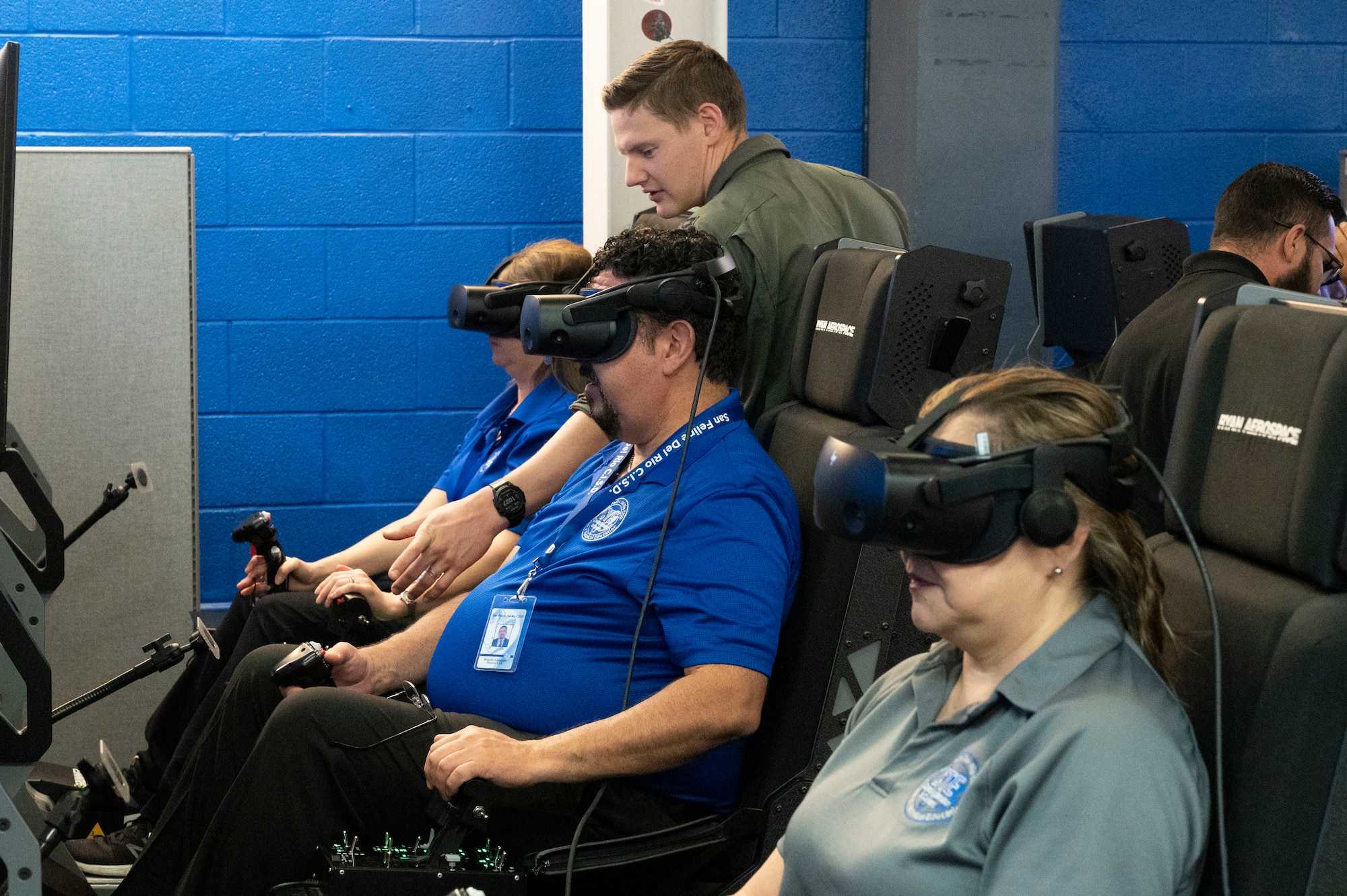 Members of the Career and Technical Education (CTE) Center experience a T-6A Texan II simulated flight during a base tour at Laughlin Air Force Base, Texas, on May 1, 2023. This tour gave the CTE group a chance to see first-hand how Laughlin’s Grow Your Own program is able to provide local students a wide variety of courses in technical knowledge and hands-on training skills. (U.S. Air Force photo by Airman 1st Class Kailee Reynolds)