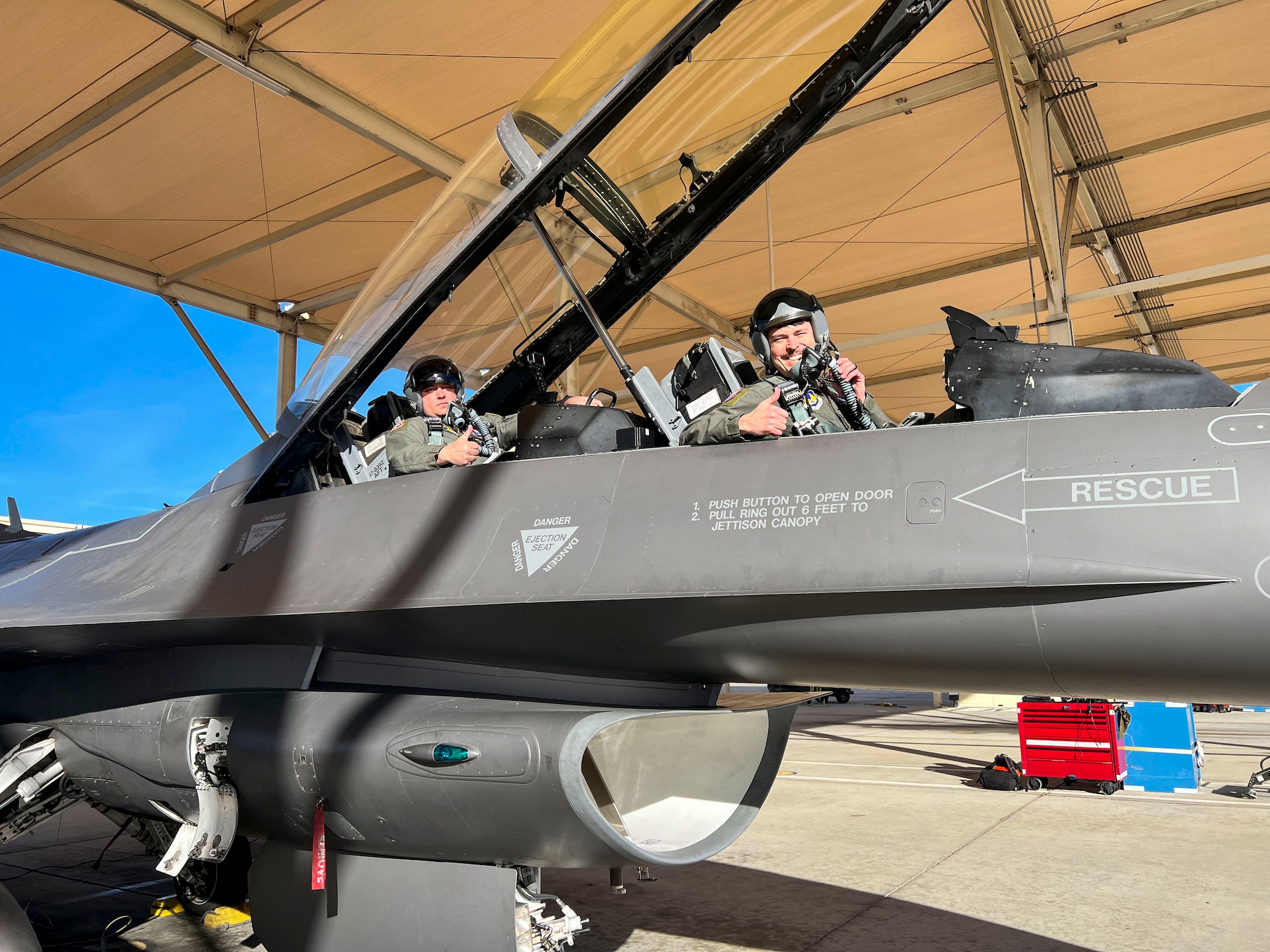 Lt. Col. Matthew Taranto, Chief Aerospace Physiologist, U.S. Air Force Test Pilot School takes a photo with Lt. Col. Christopher Taylor, U.S. Test Pilot School after conducting his "fini-flight" before retirement March 31st. (Photo courtesy of Staff Sgt. Elizabeth Taranto)