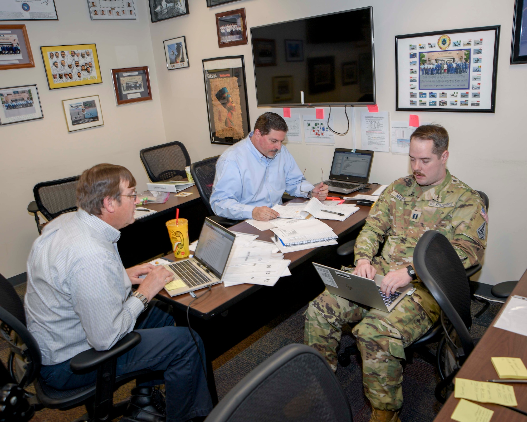 Space Mishap Investigation Course students work in small groups on their final report.