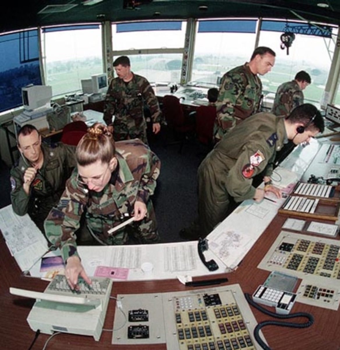 A photo of Airmen working in a tower.
