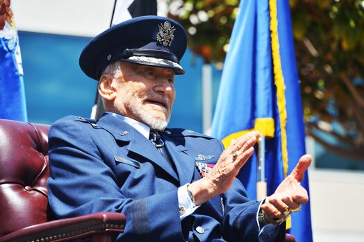  Retired Brig. Gen Buzz Aldrin sits on stage as hundreds in attendance paid homage to him during his honorary promotion ceremony at Space Systems Command on May 5, 2023. Aldrin, a notable recipient of the Presidential Medal of Freedom, Air Force Distinguished Service Medal, Legion of Merit, two Distinguished Flying Crosses, and three Air Medals, proudly served in the ranks for more than 21 years, while breaking barriers for the nation’s advancements within space. (U.S. Space Force photo by Lt Katelin Robinson)