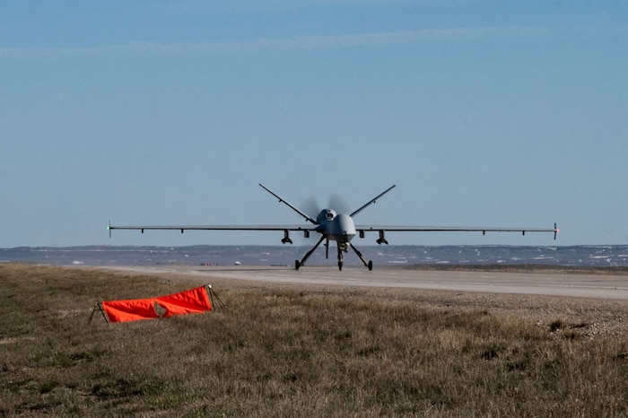 large unmanned aerial vehicle sits on road