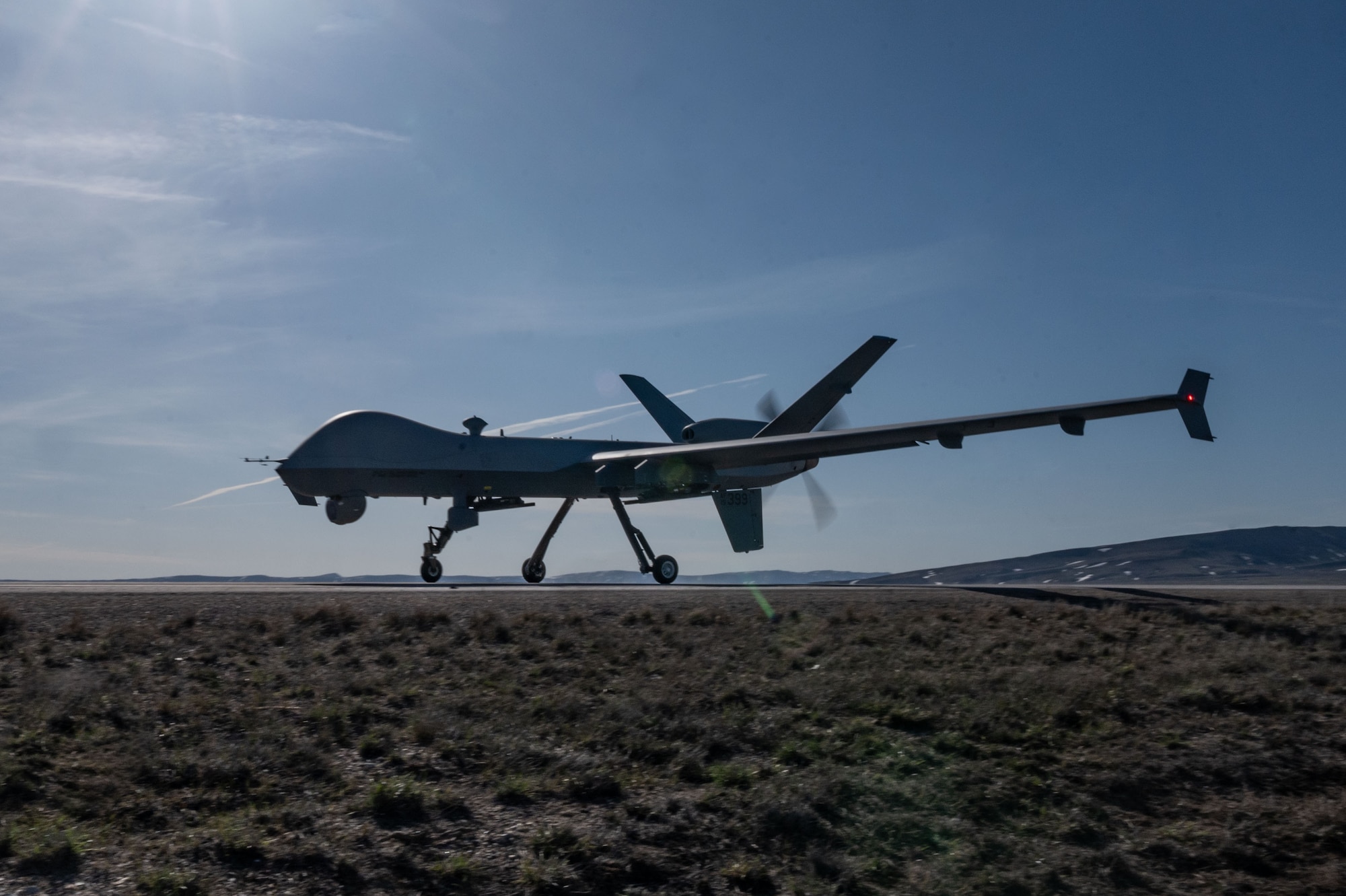 large unmanned aerial vehicle sits on road