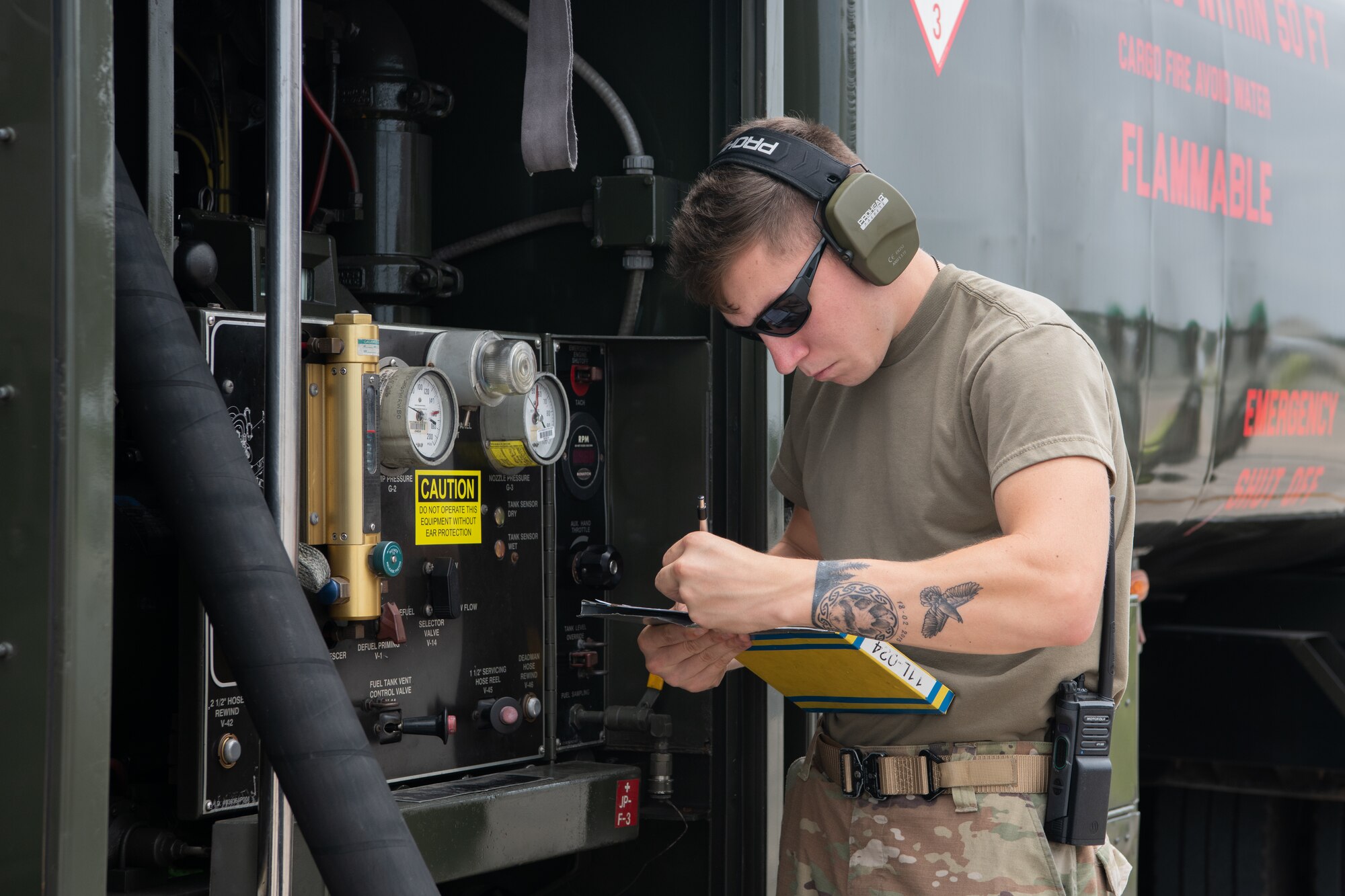 An Airman takes notes.