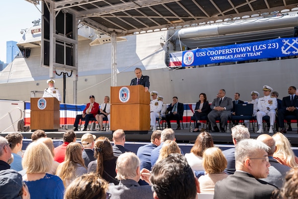Mr. Joe Torre, a member of the National Baseball Hall of Fame, speaks during the commissioning ceremony of the Freedom-variant littoral combat ship USS Cooperstown (LCS 23) in New York City.