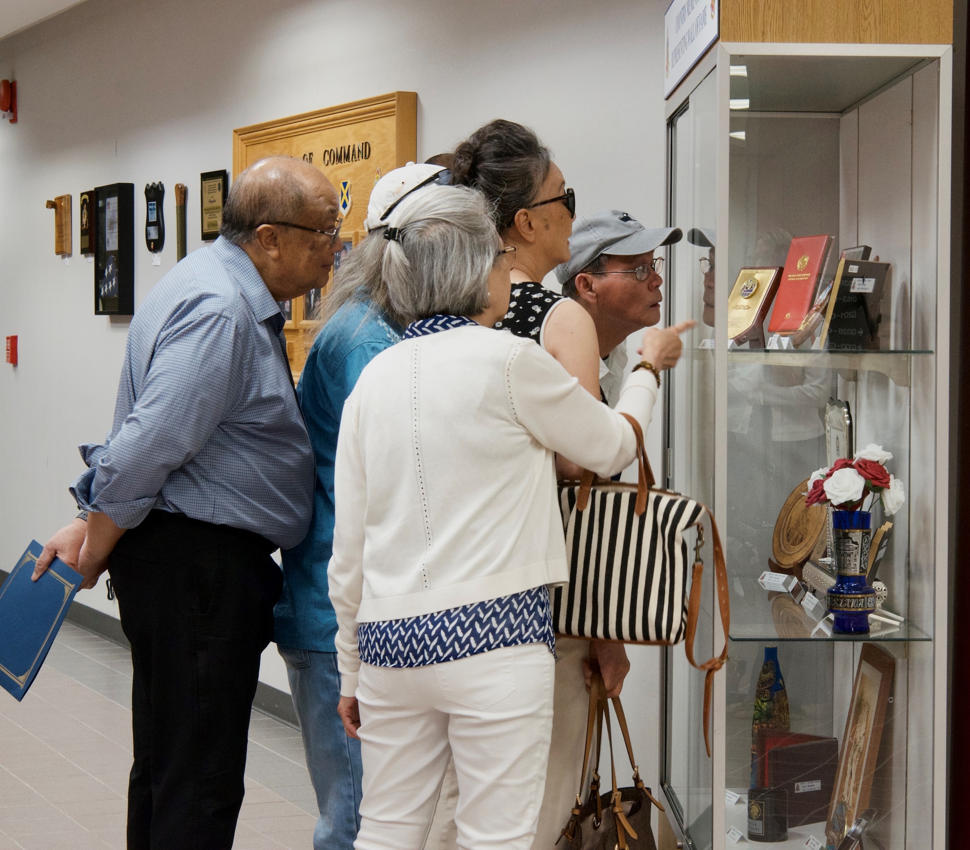 Alumni Henry Tran, Thu Nguyen, Phuong Nguyen, and family members spend the afternoon touring the Defense Language Institute English Language Center.