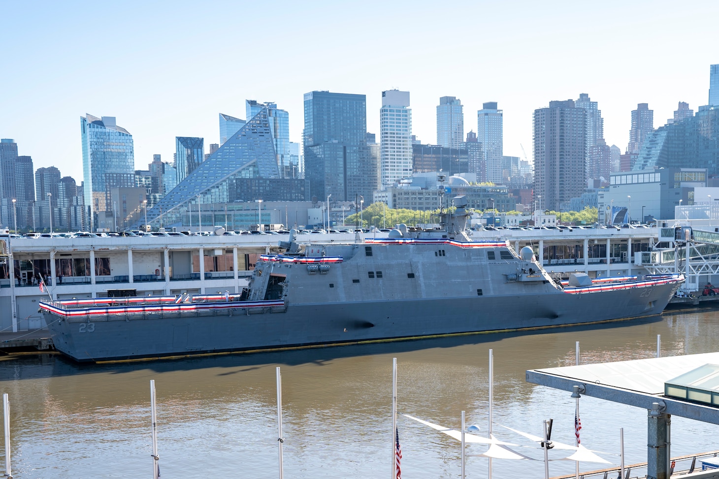 The crew of the Navy's newest Freedom-variant littoral combat ship, USS Cooperstown (LCS 23), brings the ship to life during its commissioning ceremony in New York City.