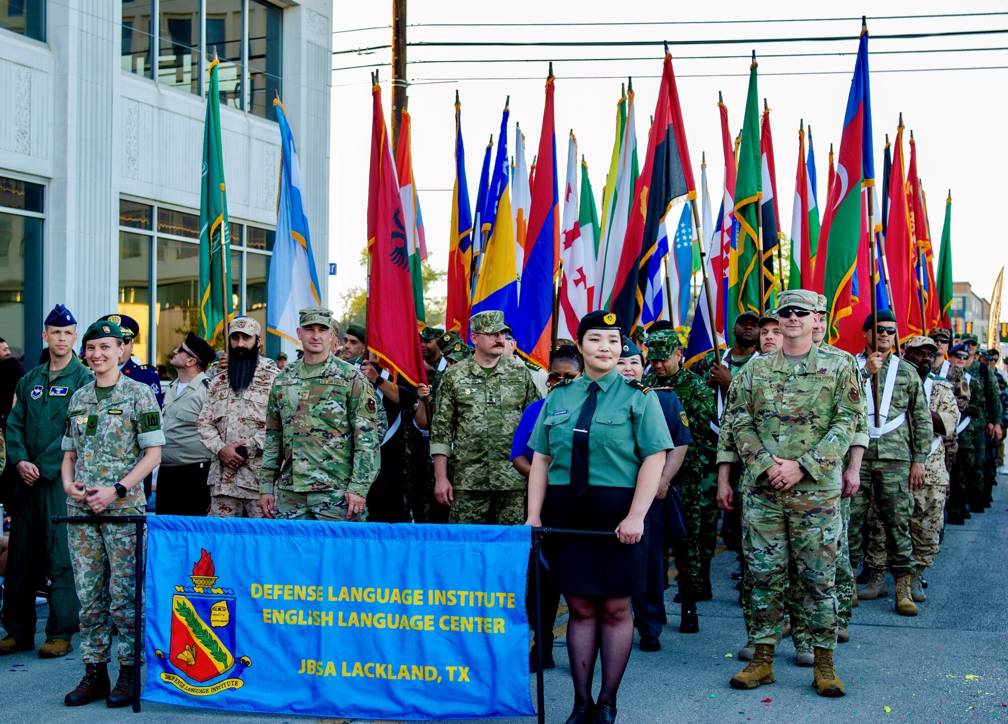 International Military Students and staff prepare to march at the annual Fiesta Flambeau parade in San Antonio, Texas, April 29, 2023.