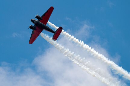 An airplane fly's overhead.