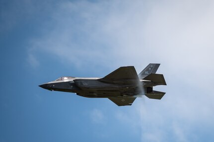 A jet fly's during an air show.