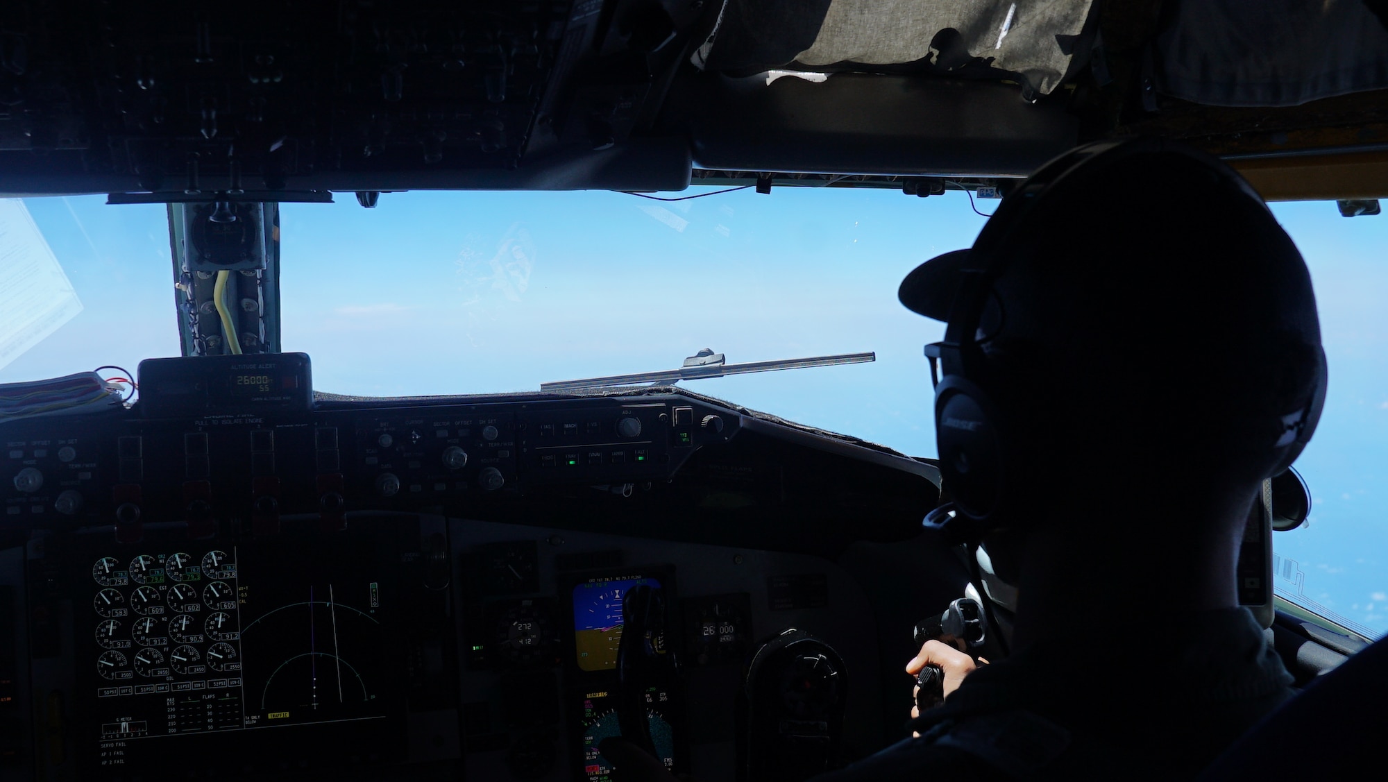 A 161st Air Refueling Wing co-pilot assigned to the 506th Expeditionary Air Refueling Squadron flies a KC-135 Stratotanker from Andersen Air Force Base, Guam in preparation for a Bomber Task Force refueling mission over the Philippine Sea on April 26, 2023. Air-to-air refueling capabilities are a key logistical enabler of U.S., allied, and partner nations’ aircraft, protecting prosperity, peace, and stability across the Pacific. (U.S. Air Force Photo by Capt. Katie Mueller)