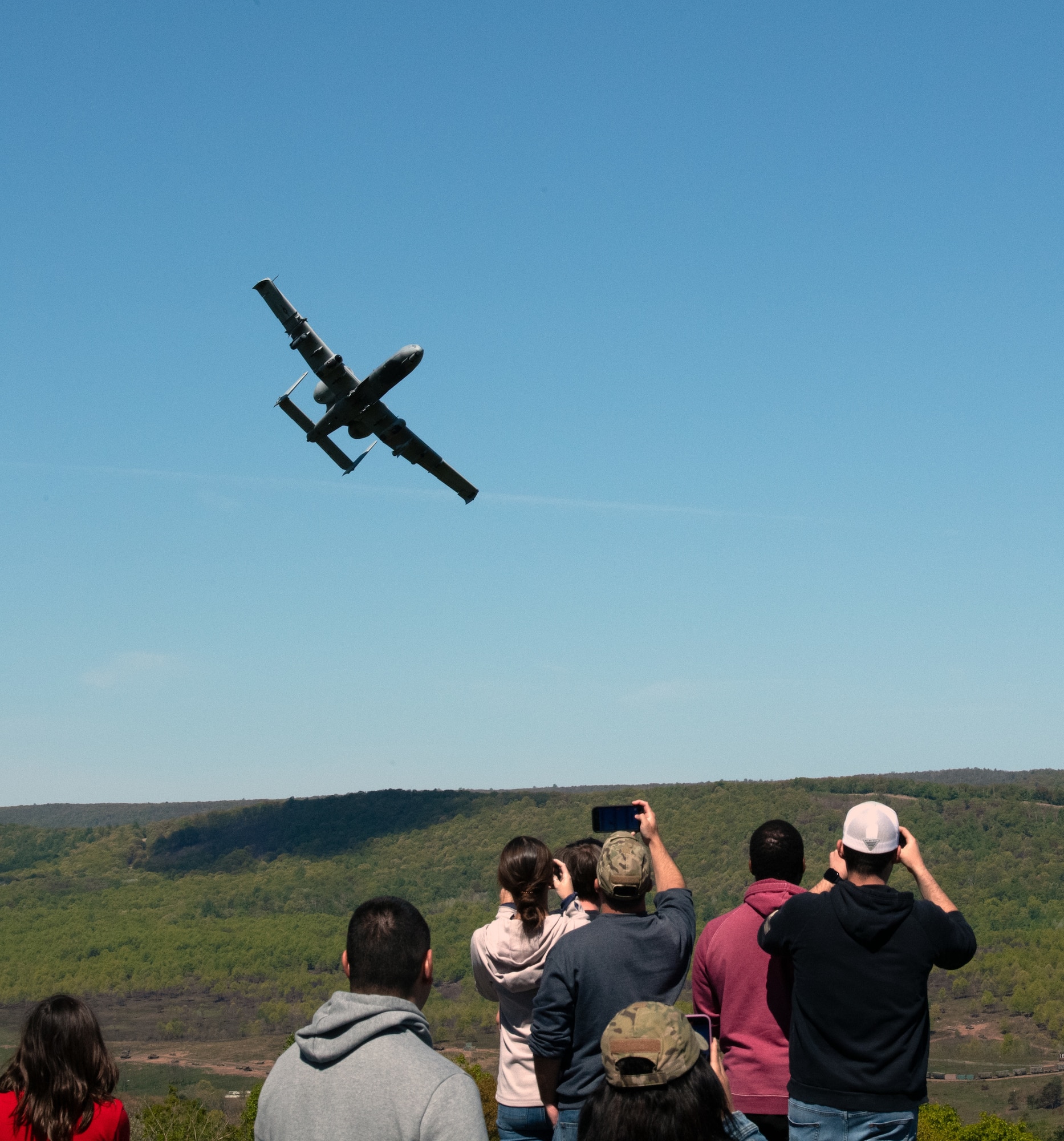 Families of 175th Wing Airmen observe A-10C Thunderbolt II aircraft assigned to the 104th Fighter Squadron conduct training exercises May 6, 2023, at Fort Indiantown Gap, Pennsylvania.