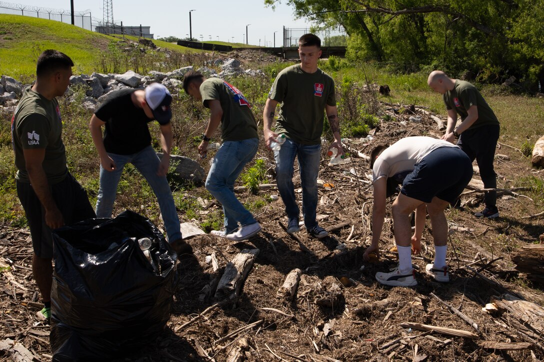 U.S. Marines with Marine Forces Reserve take part in a levee clean-up in New Orleans, April 27, 2023. Marines who volunteered cleaned up half of a mile of the Algiers levee system, tightening the bond between the Marines and their local community. (U.S. Marine Corps photo by Pfc. Nicholas Bryan)