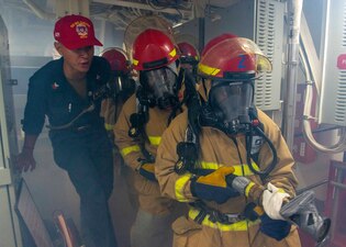 USS Paul Hamilton (DDG 60) damage control training in the Gulf of Oman.