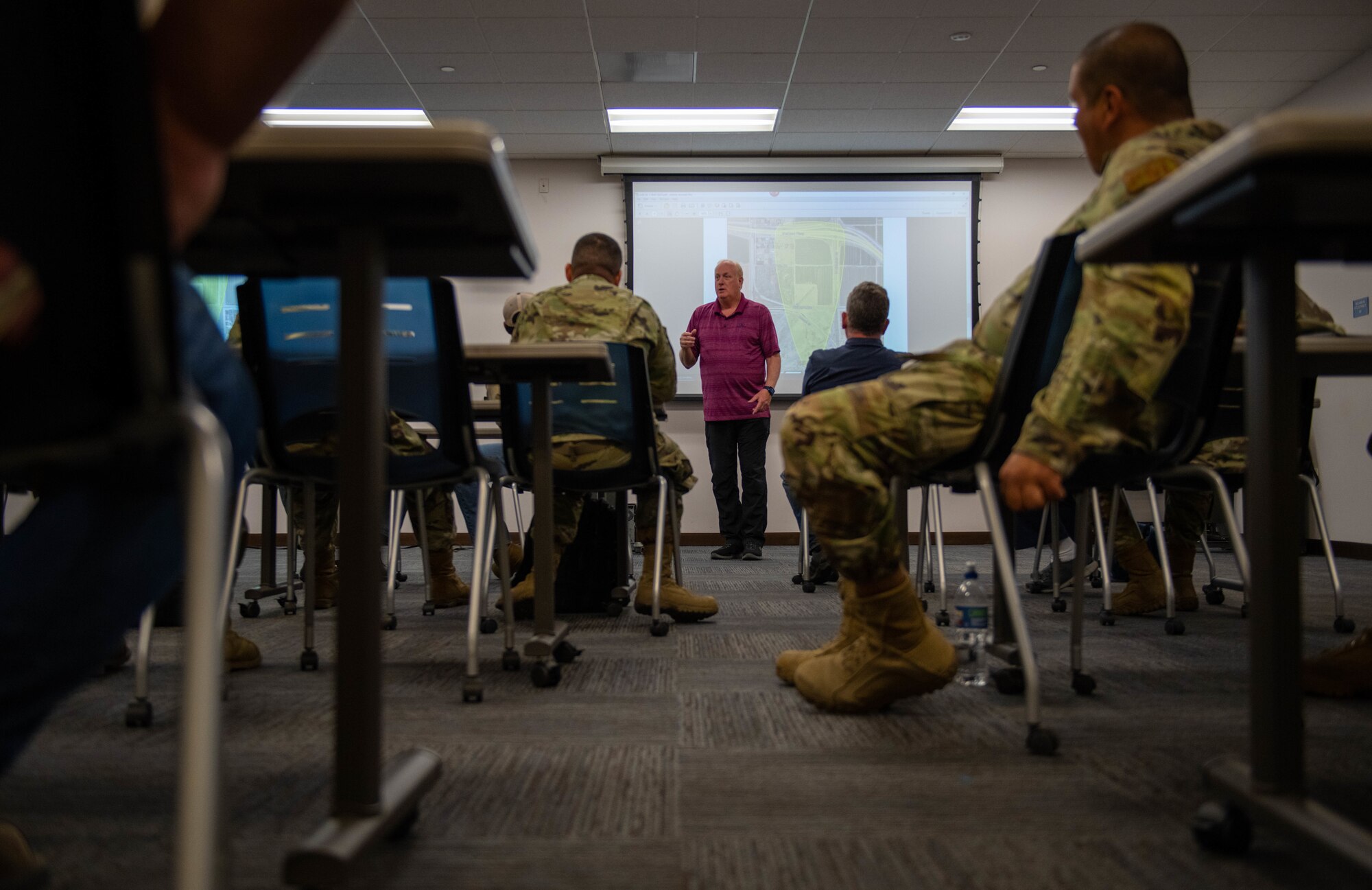 Tracy Taylor, project coordinator for the Defense Logistics Agency exercise, provides instruction at a fuel spill prevention and response training exercise May 3, 2023, at Luke Air Force Base, Arizona.