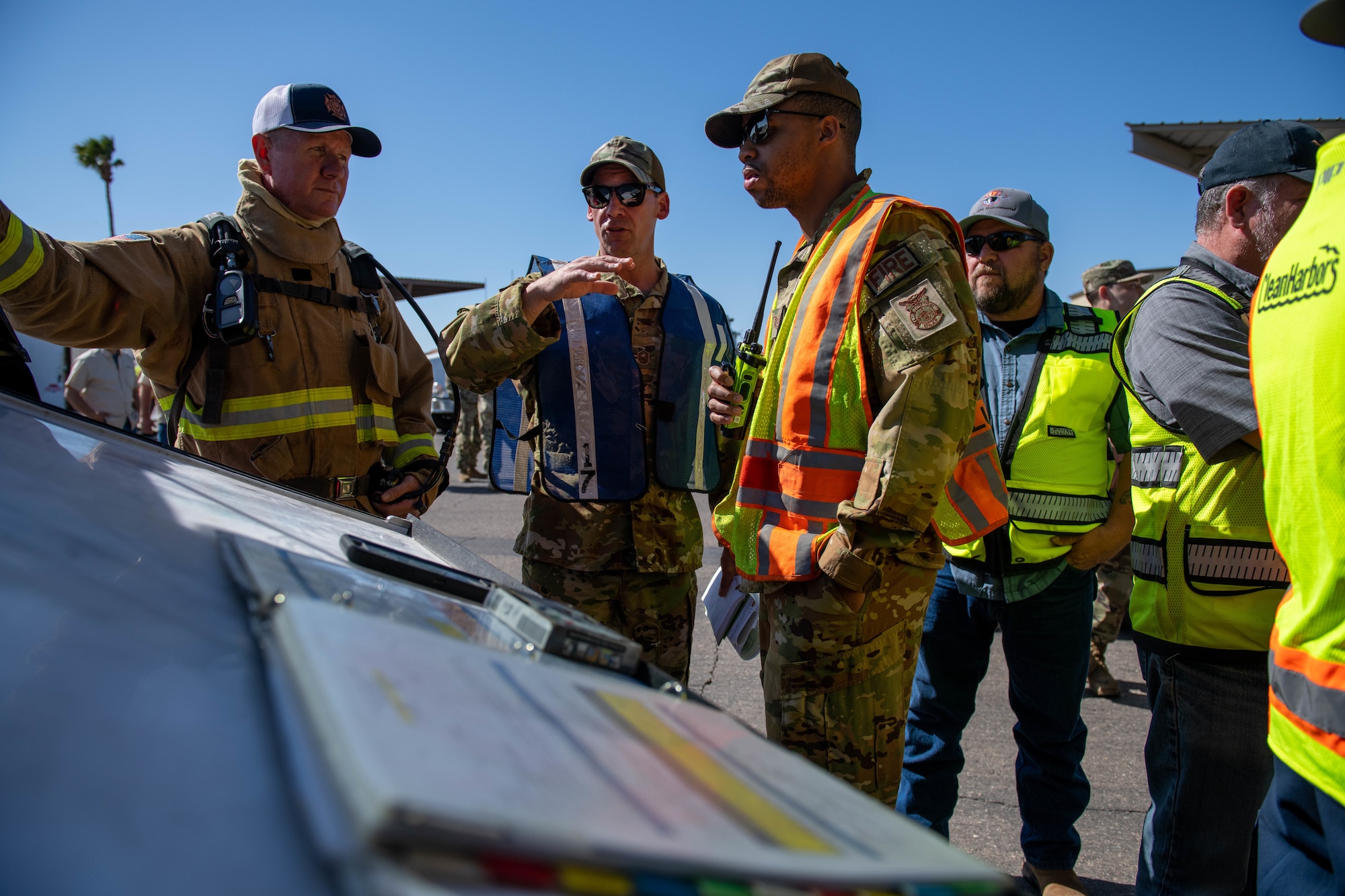 Members of the 56th Fighter Wing base response agencies participate in a Defense Logistics Agency fuel spill exercise May 4, 2023, at Luke Air Force Base, Arizona.