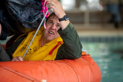 U.S. Air Force Maj. Travis Harrison with the 166th Air Refueling Squadron, 121st Air Refueling Wing, participated in Survival Evasion Resistance and Escape water survival training in Reynoldsburg, Ohio, May 7, 2023.