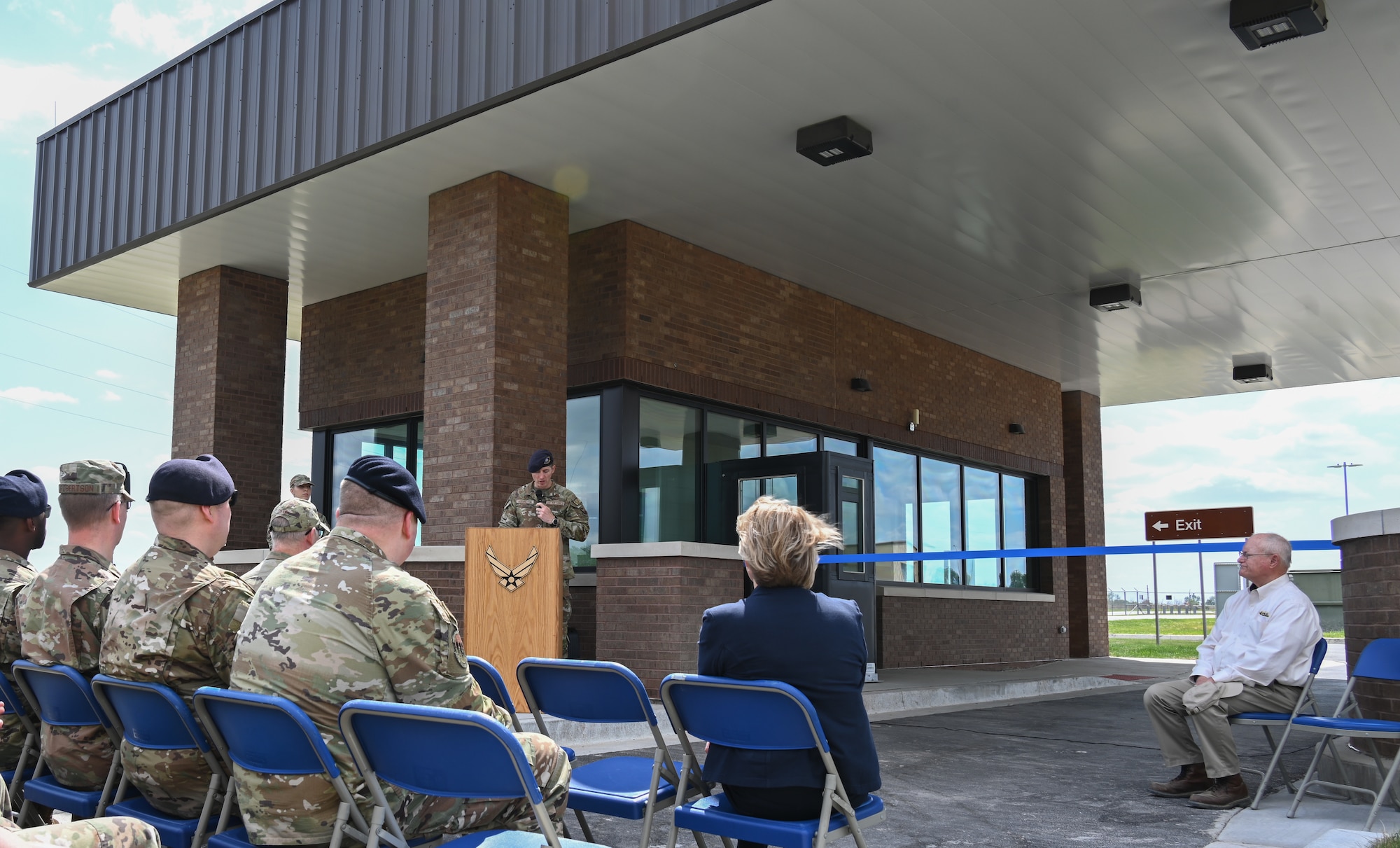 U.S. Air Force Lt. Col. Stephen Addington, 509th Security Forces Squadron commander, speaks to U.S. Air Force Airmen and community partners attending the LeMay Gate ribbon cutting ceremony at Whiteman AFB, Mo., May 5, 2023. Addington spoke about the improvements made to LeMay Gate during its time under construction. (U.S. Air Force photo by Airman 1st Class Hailey Farrell)