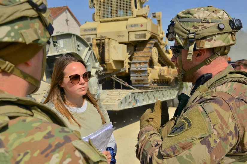 Sgt. Chase Holm, a civil affairs team sergeant with C Co/418th Civil Affairs Battalion, conducts a mock media engagement with a role player during Exercise Combined Resolve 18 here on May 4, 2023. U.S. Army Europe and Africa use Combined Resolve 18 to develop and validate practical solutions within the European theater.