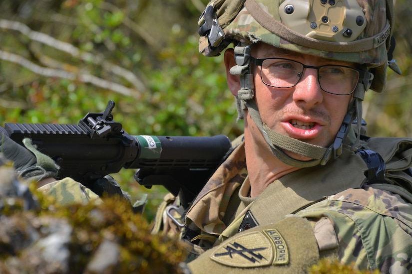 Sgt. Joseph Kuenstle, a civil affairs sergeant with C Co/418th Civil Affairs Battalion, communicates an enemy position during Exercise Combined Resolve 18 here on May 5, 2023. The Joint Multinational Readiness Center (JMRC) is the U.S. Army’s only combat training center outside the U.S., providing a mobile training capability to Europe that trains leaders, staff, and units alongside allies and partners, to dominate in the conduct of unified land operations anywhere in the world.