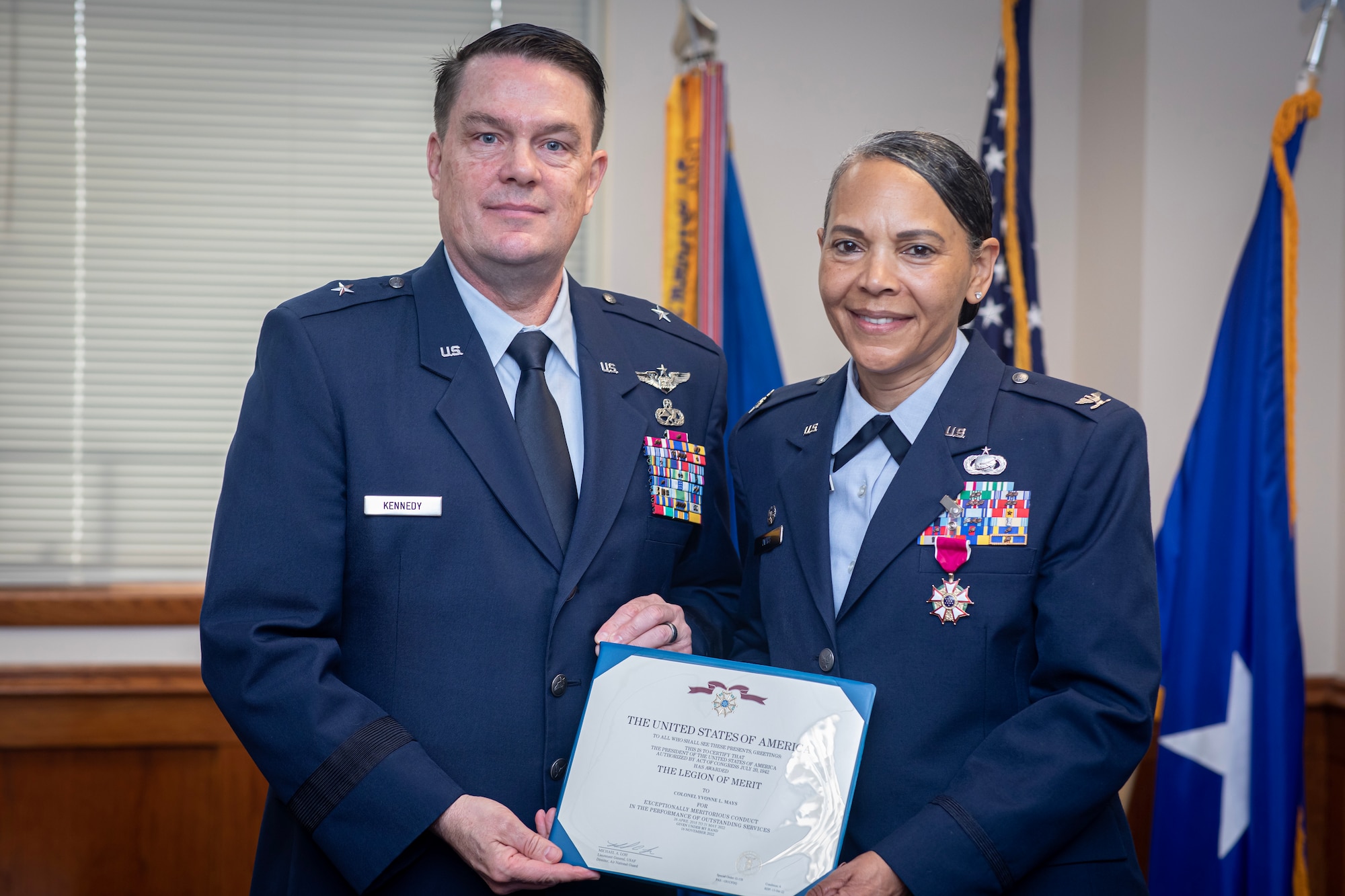 U.S. Air Force Brig. Gen. Patrick Kennedy, Assistant Adjutant General-Air, and Commander of the New Jersey Air National Guard, presents the Legion of Merit to Col. Yvonne Mays, 177th Mission Support Group Commander and Deputy Adjutant General for New Jersey, during a ceremony on Joint Base McGuire-Dix-Lakehurst, N.J., May 8, 2023.
