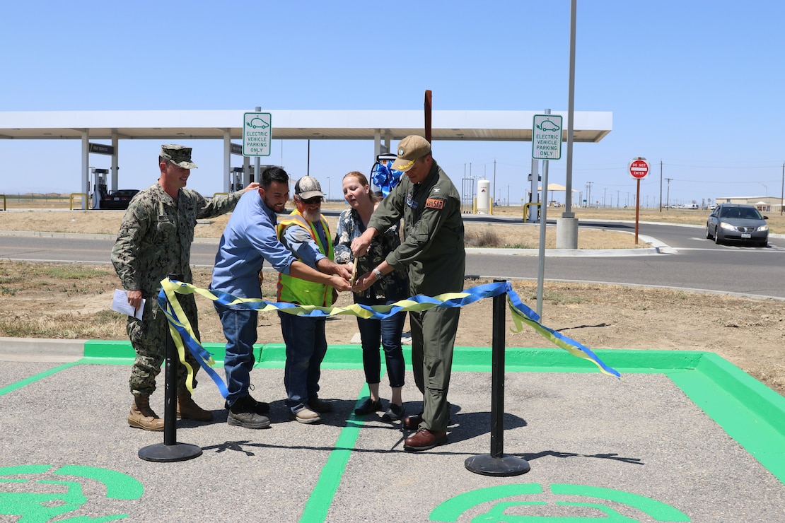 CAPT Douglas M. Peterson and CDR Greg Woods participated in a ribbon cutting ceremony on Friday, April 25, 2022, officially opening NAS Lemoore's first POV Electric Vehicle Charging Station.