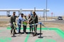 CAPT Douglas M. Peterson and CDR Greg Woods participated in a ribbon cutting ceremony on Friday, April 25, 2022, officially opening NAS Lemoore's first POV Electric Vehicle Charging Station.
