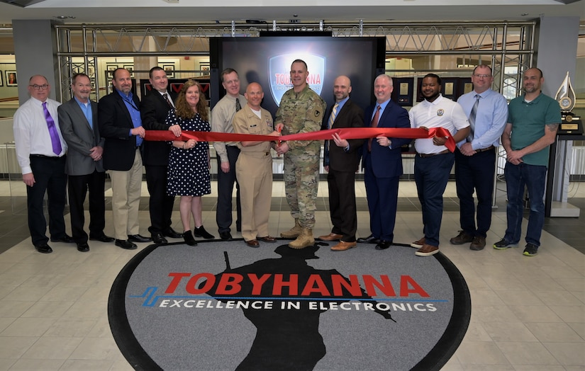 Group shot of the ribbon cutting