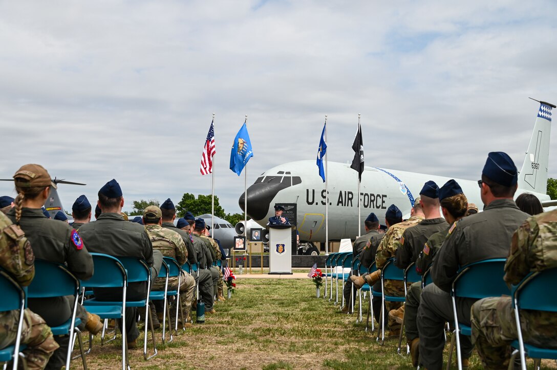 U.S. Air Force Master Sgt. Lucas Treat, 54th Air Refueling Squadron standards and evaluations superintendent, shares a poem during the Shell 77 memorial at Altus Air Force Base, Oklahoma, May 3, 2023. More than 30 Airmen and family members attended the memorial. (U.S. Air Force photo by Senior Airman Kayla Christenson)