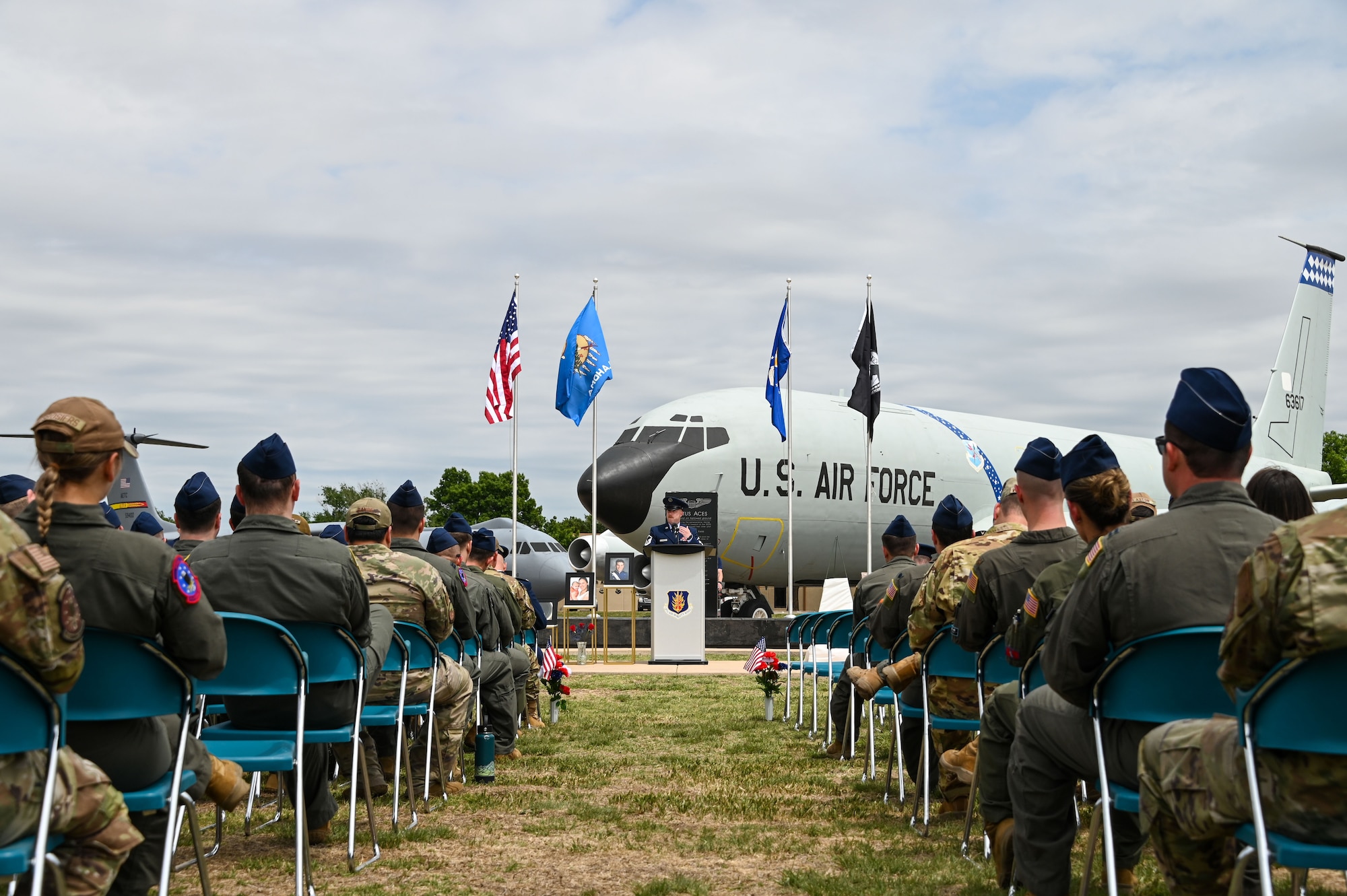 U.S. Air Force Master Sgt. Lucas Treat, 54th Air Refueling Squadron standards and evaluations superintendent, shares a poem during the Shell 77 memorial at Altus Air Force Base, Oklahoma, May 3, 2023. More than 30 Airmen and family members attended the memorial. (U.S. Air Force photo by Senior Airman Kayla Christenson)