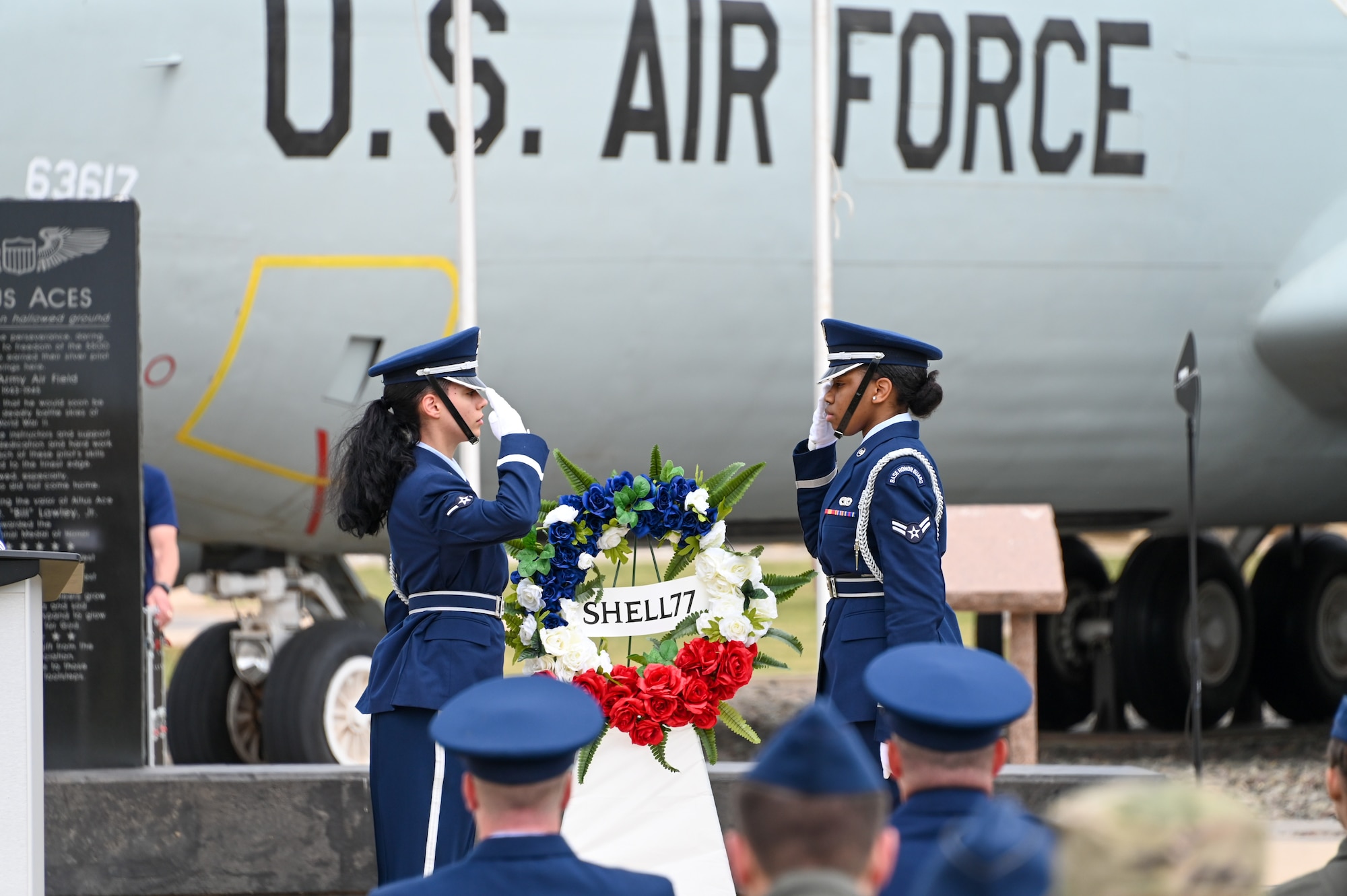 The Blue Knights Honor Guard salutes during a wreath laying for the Shell 77 memorial at Altus Air Force Base, Oklahoma, May 3, 2023. A KC-135 Stratotanker with the call sign “Shell 77” crashed ten years ago. (U.S. Air Force photo by Senior Airman Kayla Christenson)