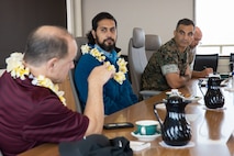 U.S Sen. Brenton Awa with Hawaii State Senate District 23, center, and Col. Speros Koumparakis, right, commanding officer, Marine Corps Base Hawaii, attend a brief at Kansas Tower, MCBH, April 27, 2023. The purpose of the visit was to discuss MCBH water consumption and the public partners program. (U.S. Marine Corps photo by Sgt. Julian Elliott-Drouin)